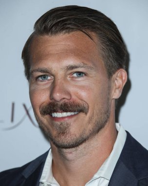 Aktris Olivia Applegate ve aktör Michael Roark, 17 Temmuz 2021 'de Santa Monica, Los Angeles, Kaliforniya, ABD' de düzenlenen Passionflix 's Driven' in 2. sezonunun Los Angeles prömiyerine geldiler..