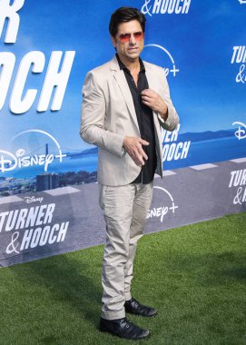 Actor John Stamos arrives at the Disney+ 'Turner & Hooch' Los Angeles Premiere Event held at the Westfield Century City Mall on July 15, 2021 in Century City, Los Angeles, California, United States. 