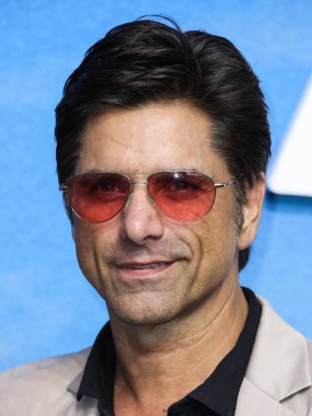 Actor John Stamos arrives at the Disney+ 'Turner & Hooch' Los Angeles Premiere Event held at the Westfield Century City Mall on July 15, 2021 in Century City, Los Angeles, California, United States.
