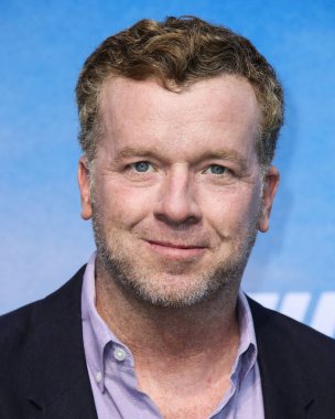 Yönetmen McG (Joseph McGinty Nichol), 15 Temmuz 2021 tarihinde Westfield Century City, Los Angeles, Kaliforniya, ABD 'de düzenlenen Los Angeles Premiere AVM' de düzenlenen Disney + 'Turner & Hooch' a ulaşır.. 