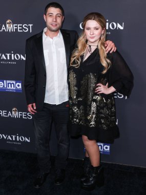 Ira Kunyansky and girlfriend/American actress and singer Abigail Breslin arrive at the 22nd Annual Screamfest Horror Film Festival - World Premiere Of The Avenue Entertainment's 'Slayers' held at TCL Chinese 6 Theatres on October 14, 2022 in USA clipart