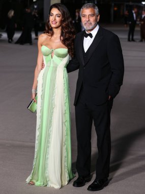 Amal Alamuddin Clooney ve kocası George Clooney, 15 Ekim 2022 'de ABD' nin Kaliforniya eyaletinin Los Angeles kentinde bulunan Akademi Sinema Filmleri Müzesi 'nde Rolex tarafından sunulan 2..