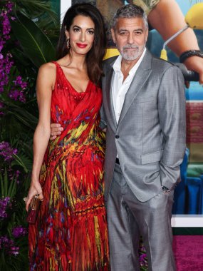 Alexander McQueen elbisesi giyen Amal Alamuddin Clooney ve kocası / Amerikalı aktör ve film yapımcısı George Clooney, 17 Ekim 2022 'de ABD' nin Los Angeles kentinde bulunan Universal Pictures 'Ticket to Paradise' ın galasına geldiler..