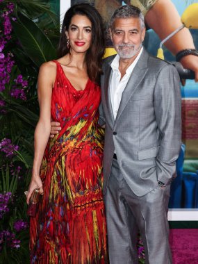Alexander McQueen elbisesi giyen Amal Alamuddin Clooney ve kocası / Amerikalı aktör ve film yapımcısı George Clooney, 17 Ekim 2022 'de ABD' nin Los Angeles kentinde bulunan Universal Pictures 'Ticket to Paradise' ın galasına geldiler..