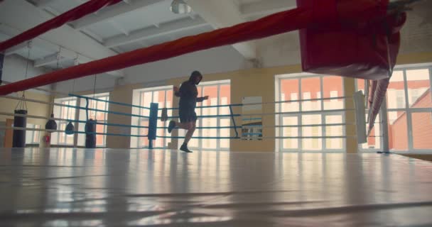 Boxer in gym - rope jumping workout. Slow motion. — Video Stock