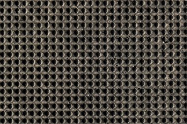 Arkaplan olarak kullanmak için kare kutulardan yapılmış siyah vinil panel