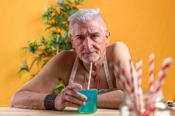 Handsome Middle Aged Man Sitting Table Drinking Blue Soft Beverage — Foto de Stock