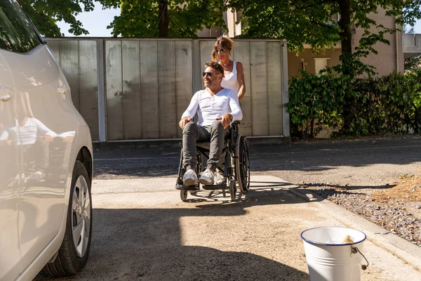 Happy Middle Aged Couple Man Sitting Wheelchair Washing Car Public — Photo