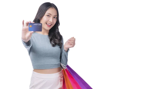 Excited Asian Showing Credit Card Holding Shopping Bags Arm Standing — Stock fotografie