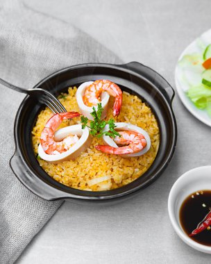 Com Nieu VietNam seafood, salad, bowls, and plates with food top view  