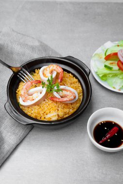 Com Nieu VietNam seafood, salad, bowls, and plates with food top view  