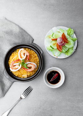 Com Nieu VietNam seafood, salad, bowls, and plates with food top view  