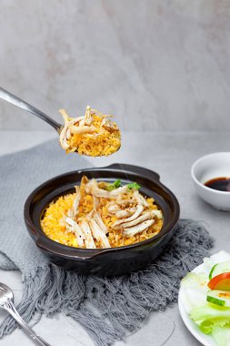 Com Nieu VietNam shredded chicken, salad, bowls, and plates with food top view  