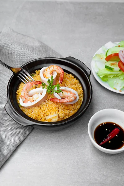 Com Nieu VietNam seafood, salad, bowls, and plates with food top view  