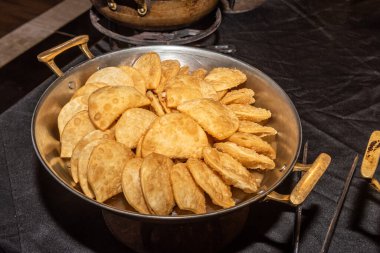 Rich portion of cheese pastel and ground beef pastel