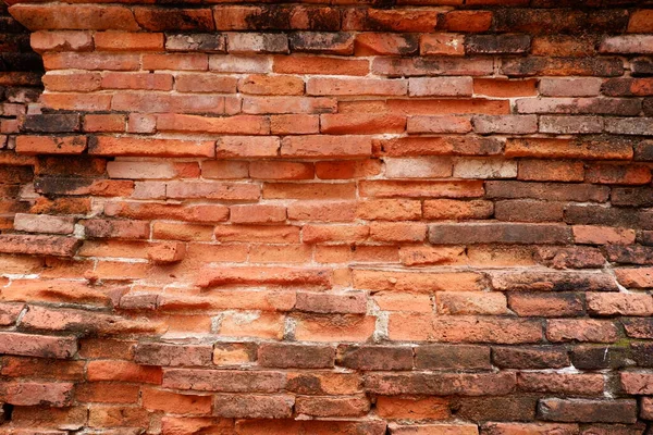 In the ancient temple, there was a wall made of red bricks. With more than 200 years old making it beautiful. Can be used to make a beautiful background image