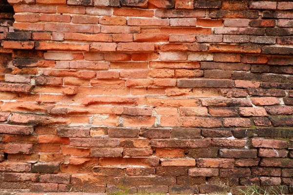 In the ancient temple, there was a wall made of red bricks. With more than 200 years old making it beautiful. Can be used to make a beautiful background image
