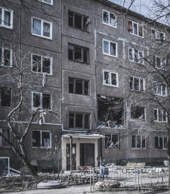 A panel residential building that was hit by an artillery shell in Ukraine during a military escalation of hostilities and armed military aggression
