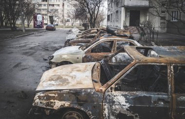 Burnt cars after shelling by rocket artillery in a residential area in Ukraine during the military escalation of hostilities and armed military aggression