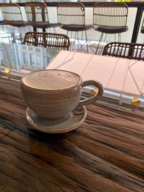Close-up of ceramic cup with coffee