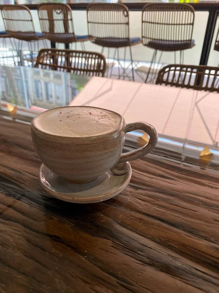 Close-up of ceramic cup with coffee