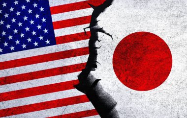 USA vs Japan concept flags on a wall with a crack. United States of America and Japan political conflict, war crisis, economy relationship, trade concept