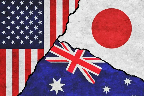 USA, Australia and Japan painted flags on a wall with a crack. United States of America, Japan and Australia relations