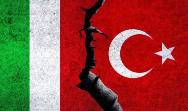 Italy vs Turkey flags on a wall with crack. Turkey Italy relations. Italy Turkey conflict, war crisis, economy, relationship, trade concept