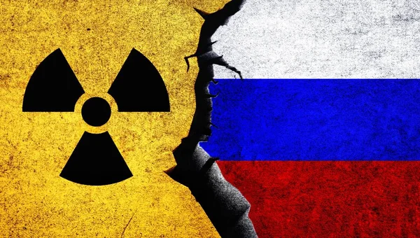 Russia and Nuclear sign on wall with cracked. Russia Nuclear deal, negotiation, threat, relations concept