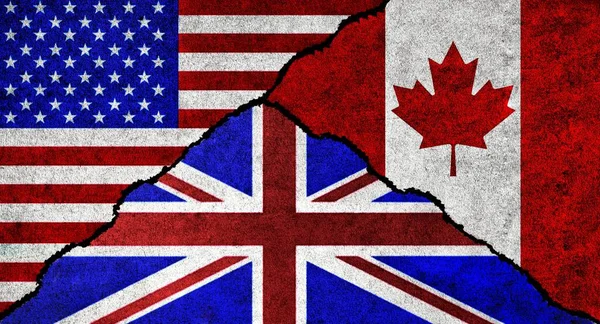 USA, United Kingdom and Canada flag together on a textured wall. Diplomatic relations between Canada, Great Britain and United States of America