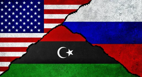 USA, Russia and Libya flag together on a textured wall. Relations between Russia, Libya and United States of America