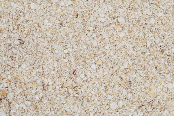 High angle full-frame photo of ground oats making pattern for background, wallpaper