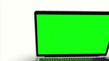 Yeşil dizüstü bilgisayar LCD ekranı ve beyaz arkaplan ekran ile hareket eden 3d dizüstü bilgisayar modeli, bunu depo görüntüleriniz için kullanabilir, kullandığınız yazılımı kullanarak yeşil dizüstü bilgisayar lcd ekranını silebilirsiniz 