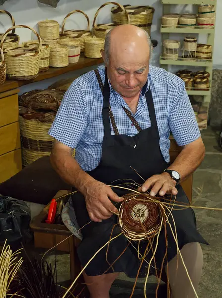 Greek craftsman in basket weaving, Tinos, Greece. High quality photo