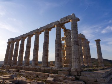 Ancient Temple of Poseidon during sunset at Sounio, Greece