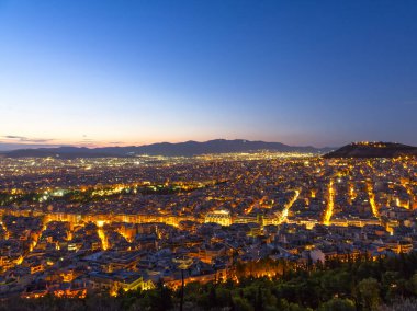 Athens cityscape illuminated at dusk. High quality photo