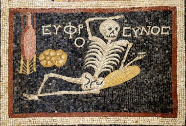 In the ancient city of Antiocheia in Hatay, a Skeleton Mosaic belonging to the 3rd century BC with the Greek words 