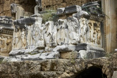 Magnificently beautiful amphitheatre and marble carved decorations in the ancient city of Perge                    