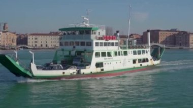 Actv Ferries San Marco cruising Giudecca canal. High quality 4k footage