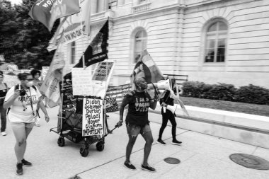  group of people gathering to protest