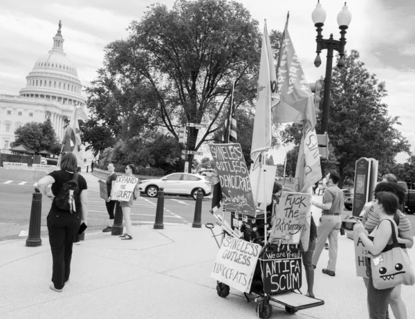  group of people gathering to protest