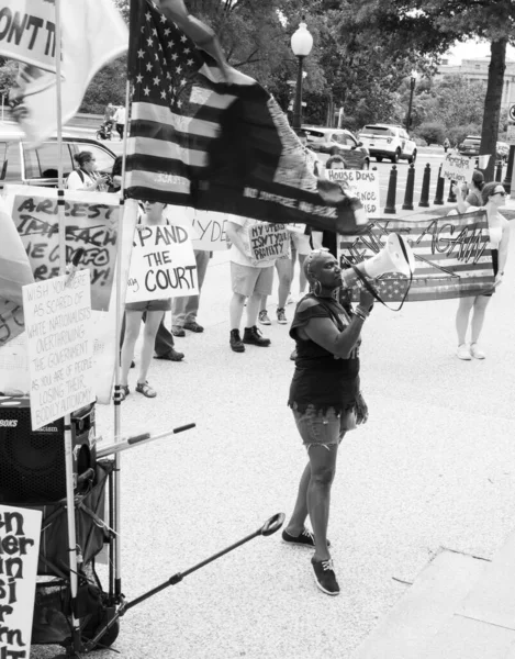protesting  around the capital  about women  rights 