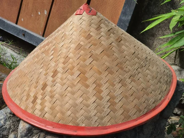 Head cover from the heat of the typical Indonesian sun called caping