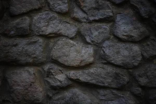 stone texture wall of large gray stones of different sizes and shapes.for banners, labels, flyers