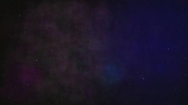 dark space background with stars and milky way.