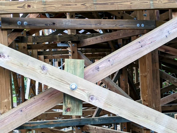 close up of Wood beam framework bolted together