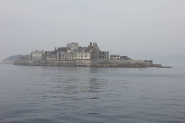 View of the ruined buildings in an abandoned island near Nagasaki, Japan