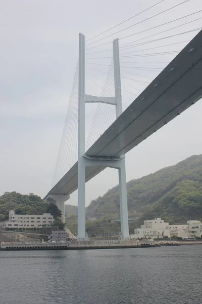 Megami big bridge toward battleship island. Gunkanjima ,near Mitsubishi shipyard in Nagasaki bay.