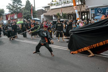Batu, Indonesia - August 7, 2022: Batu City Local Cultural Arts Festival, Bantengan Nuswantara 2022.