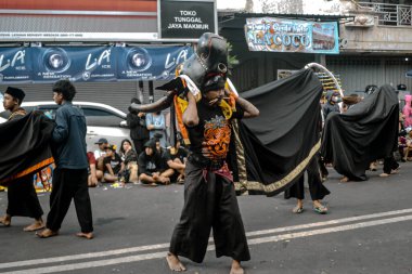 Batu, Indonesia - August 7, 2022: Batu City Local Cultural Arts Festival, Bantengan Nuswantara 2022.
